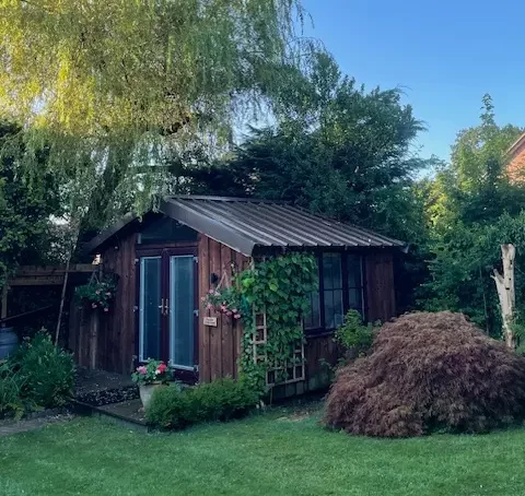 Exterior view of Jane Ford's reflexology practice, showing the welcoming entrance to her serene and professional space in Warwickshire.